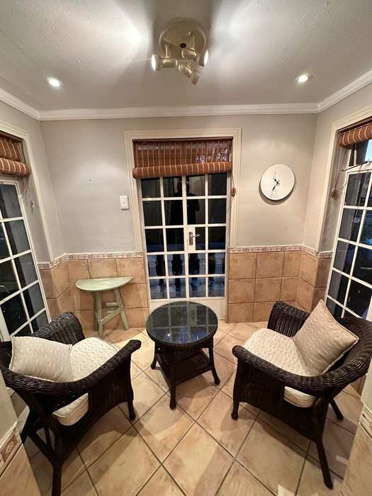 Deluxe Garden Room private conservatory seating area