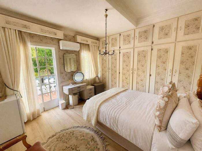 Bedroom 1 brass bed and dresser