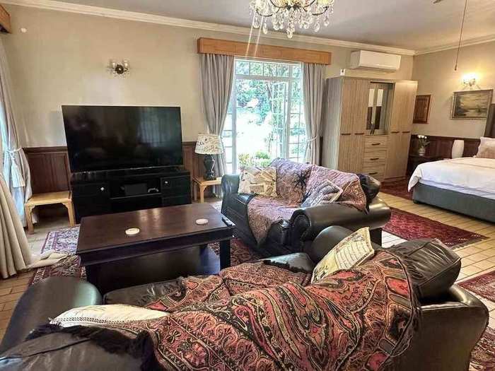 Dining and dressing area beside panoramic windows