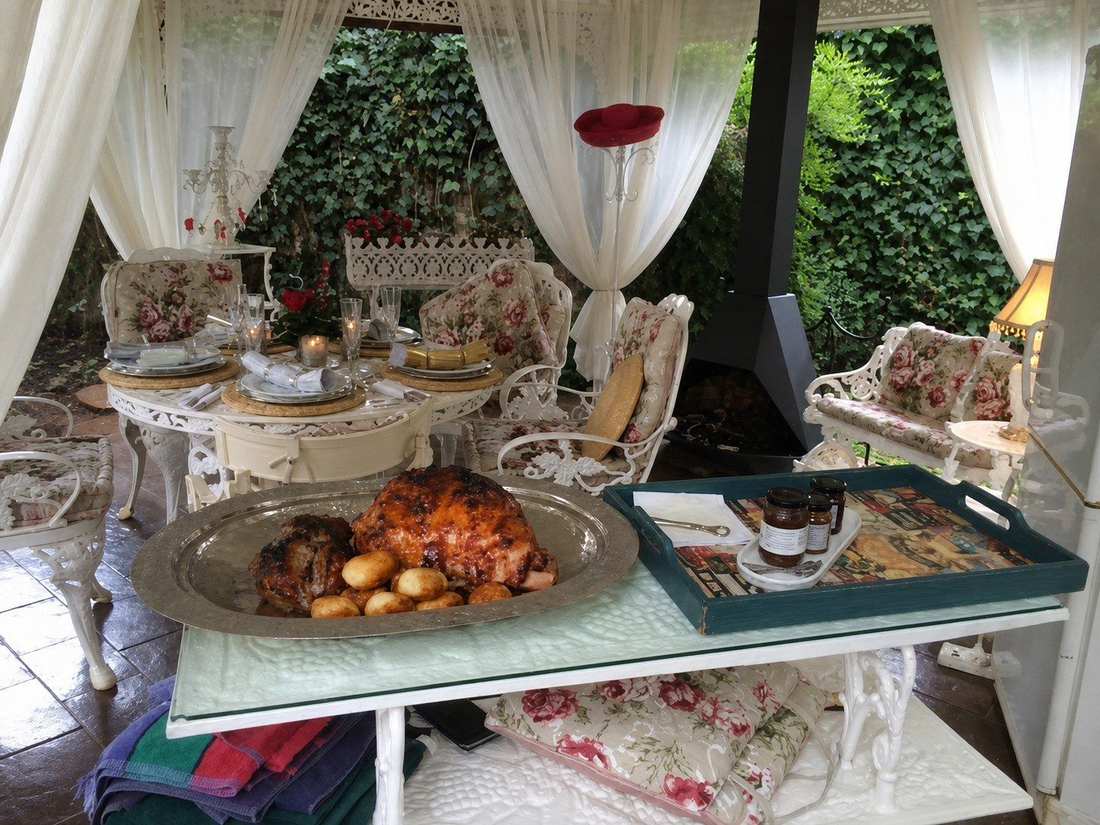 White garden gazebo set for a relaxed outdoor meal