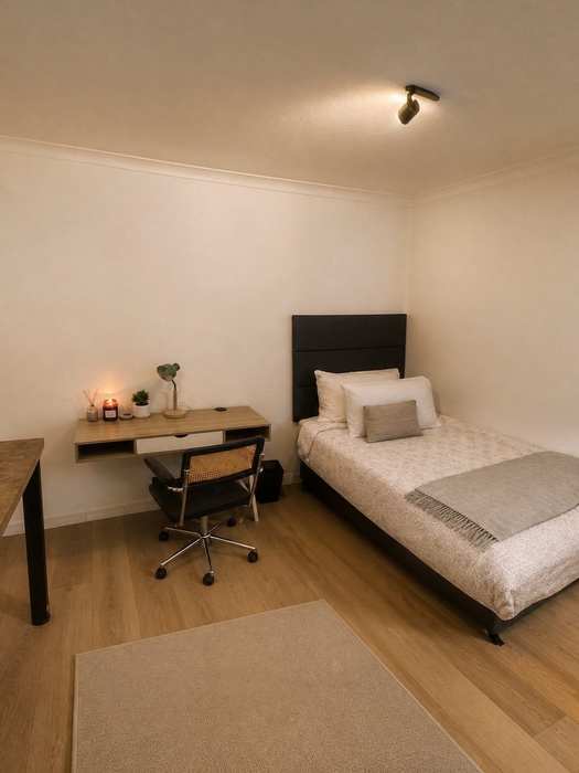 Furnished Garden Court student unit with single bed and desk