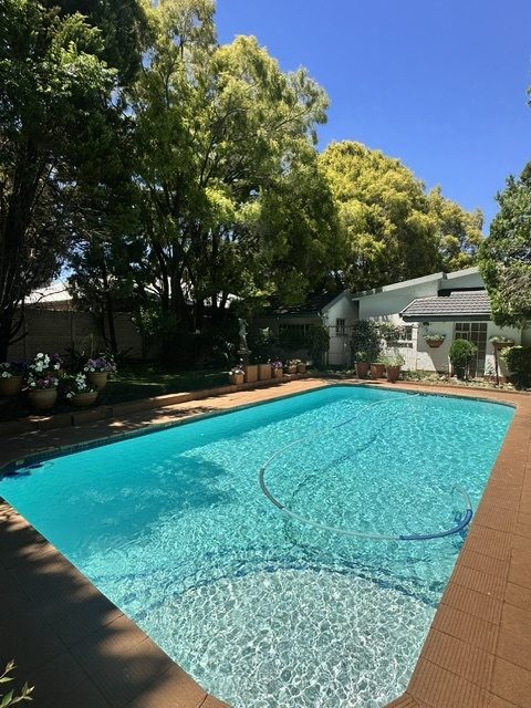 Garden Court swimming pool on a sunny day